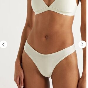 NWT cotton jersey dipped thong. Size M in Bone